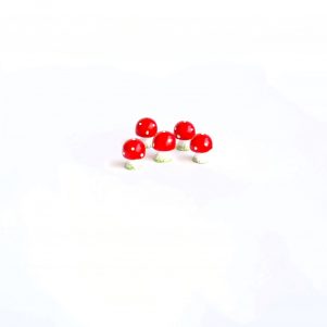 Miniature red toadstools